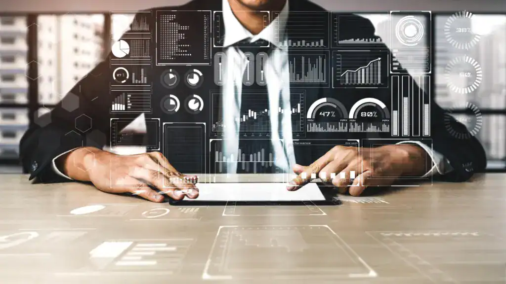 Business professional using a digital analytics dashboard with business intelligence reporting metrics