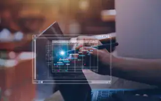 Professional using a tablet to analyse data trends and performance