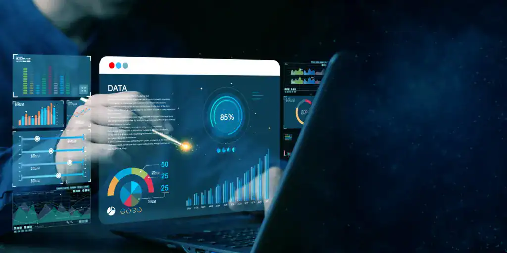 Data analyst reviewing a digital dashboard with charts and performance metrics